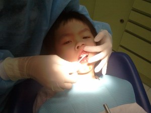 YH having his teeth extracted