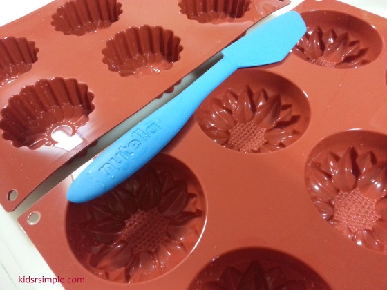 Silicone moulds and a butter knife